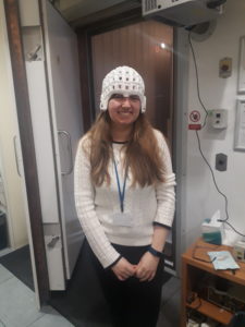 Steph Mellor trying on the new OP-MEG wearable helmet design.
