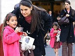 Blossoming into the image of her mother: Suri Cruise and Katie Holmes wear matching headbands to the ballet 
