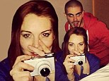 Did Lindsay get her man? Lohan proudly flaunts a picture of her posing with Max George from The Wanted