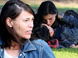 Argo star Clea DuVall shares lesbian kisses with female friend during day of passion in the park 