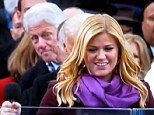 Peekaboo! Kelly Clarkson gets 'photo bombed' by Bill Clinton as she performs at Obama Inauguration