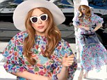 Bright and blinding! Lady Gaga stops traffic in colourful dress and floppy hat... during visit to Kitson Kids 