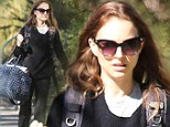 Scruffy Swan! Natalie Portman continues her unflattering trend in clothes with shapeless sweater and baggy trousers