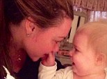 Mummys Girl: Michelle Heaton wastes no time showing her baby daughter Faith how much she loves her